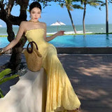 KYLETHOMASW  -  French Summer White Lace Sexy Club Slip Long Dress Women Yellow Backless Pleated Wrap Hip Fishtail Evening Dress 2025 Simplicity