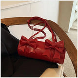 KYLETHOMASW  -  Niche Bow Bag Female 2025 New One-shoulder Underarm Bag All-match Slung Portable Cylinder Design Handbag Women