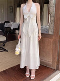 KYLETHOMASW  -  French Vacation Style Hanging Neck Striped Vest Dress Women Summer New Design Butterfly Bow Long Dresses