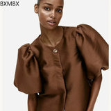 KYLETHOMASW  -  spring and summer new women's clothing fashion casual one-button bubble sleeve shirt casual short top women