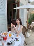 KYLETHOMASW  -  French Vacation Style Hanging Neck Striped Vest Dress Women Summer New Design Butterfly Bow Long Dresses