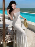 KYLETHOMASW  -  French Summer White Lace Sexy Club Slip Long Dress Women Yellow Backless Pleated Wrap Hip Fishtail Evening Dress 2025 Simplicity
