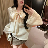 KYLETHOMASW  -    Sweet Hot Girl Pure Sexy Bow Lace-up Sweater Women's Autumn Hollowed-out Slash Neck Loose Knitwear Fashion Female Clothes