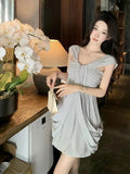 KYLETHOMASW  -  2024 Summer New Women's Gray High Waist Vacation Backless Slip Mini Dress Sexy Club Sleeveless Pleated Short Dress Fashion Trend