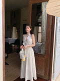 KYLETHOMASW  -  French Vacation Style Hanging Neck Striped Vest Dress Women Summer New Design Butterfly Bow Long Dresses