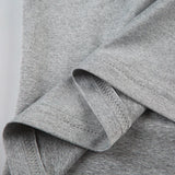 KYLETHOMASW  -  Asymmetric off shoulder sloping neck T-shirt for niche hot girls,  summer American light mature style slim fit short knitted top