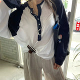 KYLETHOMASW  -  Korean Autumn Versatile Loose Pullover Top Niche Fashion Contrasting Long Sleeved Knitted Top Casual Button Decoration Loose Top