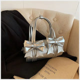KYLETHOMASW  -  Niche Bow Bag Female 2025 New One-shoulder Underarm Bag All-match Slung Portable Cylinder Design Handbag Women