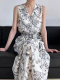KYLETHOMASW  -  2025 New Korean Chic Summer Retro Ethnic Style V-neck Floral Print Strap Waist Cinching Slimming Floral Vest Dress