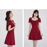 KYLETHOMASW  -  Women's Cleanfit A-Line Dress Summer 2025 Orange Bells Design Slimming Waist Square Collar Bubble Sleeve Fashionable Dress