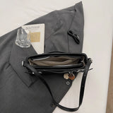 KYLETHOMASW  -  Women's Soft Leather Crossbody Bag Pom Pom Charm Decor Adjustable Strap Minimalist Elegant Commuter Daily Shoulder Bag