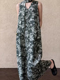 KYLETHOMASW  -  2025 New Korean Chic Summer Retro Ethnic Style V-neck Floral Print Strap Waist Cinching Slimming Floral Vest Dress