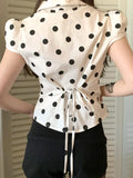 KYLETHOMASW  -  Polka dot short sleeved breasted shirt design with a cinched waist and tie, light and mature satin short commuter top