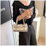 KYLETHOMASW  -  Niche Bow Bag Female 2025 New One-shoulder Underarm Bag All-match Slung Portable Cylinder Design Handbag Women