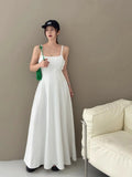 KYLETHOMASW  -  2025 Retro Style Backless Denim Camisole Dress Women Summer New Design That Accentuates Slim Elongated Silhouette