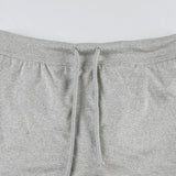 KYLETHOMASW  -  Women's basic solid color low waist elastic drawstring A-line hip bag skirt side slit spicy girl casual sports pants skirt