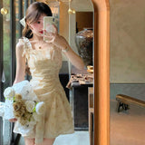 KYLETHOMASW  -  French Romantic Yellow Fragmented Flower Short Dress Summer New Sweet Girl Sleeveless Slim Fit A-line Suspended Dress for Women