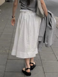 Kylethomasw   -  Korean Fashion White Hollow Out Midi Skirts Women Summer High Waist Ruffle Pocket Long Skirt Elegant Casual Faldas Lady 2024 New