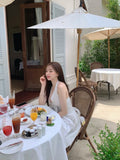 KYLETHOMASW  -  French Vacation Style Hanging Neck Striped Vest Dress Women Summer New Design Butterfly Bow Long Dresses