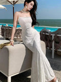KYLETHOMASW  -  French Summer White Lace Sexy Club Slip Long Dress Women Yellow Backless Pleated Wrap Hip Fishtail Evening Dress 2025 Simplicity