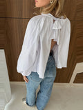 KYLETHOMASW  -  Hollow Out Backless Bowknot Blouses For Women Solid Lantern Sleeve Stand Collar Shirts Lady 2025 Spring Summer Streetwear Tops