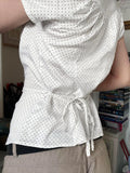 KYLETHOMASW  -  Polka dot short sleeved breasted shirt design with a cinched waist and tie, light and mature satin short commuter top