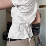 KYLETHOMASW  -  Polka dot short sleeved breasted shirt design with a cinched waist and tie, light and mature satin short commuter top
