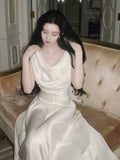 KYLETHOMASW  -  Bias Cowl Neck Maxi Skirt Set  Acetate Look Satin Co Ord Lengthened Silhouette Fluted Hem