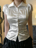 KYLETHOMASW  -  Polka dot short sleeved breasted shirt design with a cinched waist and tie, light and mature satin short commuter top
