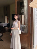 KYLETHOMASW  -  French Vacation Style Hanging Neck Striped Vest Dress Women Summer New Design Butterfly Bow Long Dresses