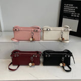 KYLETHOMASW  -  Women's Soft Leather Crossbody Bag Pom Pom Charm Decor Adjustable Strap Minimalist Elegant Commuter Daily Shoulder Bag