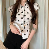 KYLETHOMASW  -  Polka dot short sleeved breasted shirt design with a cinched waist and tie, light and mature satin short commuter top