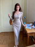 KYLETHOMASW  -  Autumn Winter French Casual Long Sleeve Women Solid Split Package Hip Dress Elegant chic Slim V-neck Ladies Skinny Bodycon Dress