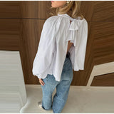 KYLETHOMASW  -  Hollow Out Backless Bowknot Blouses For Women Solid Lantern Sleeve Stand Collar Shirts Lady 2025 Spring Summer Streetwear Tops